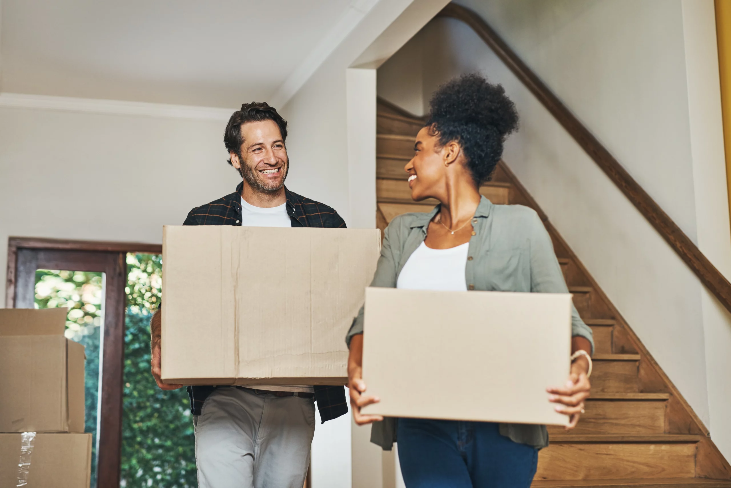 Couple moving into their first home financed through a mortgage broker | Oceania Finance