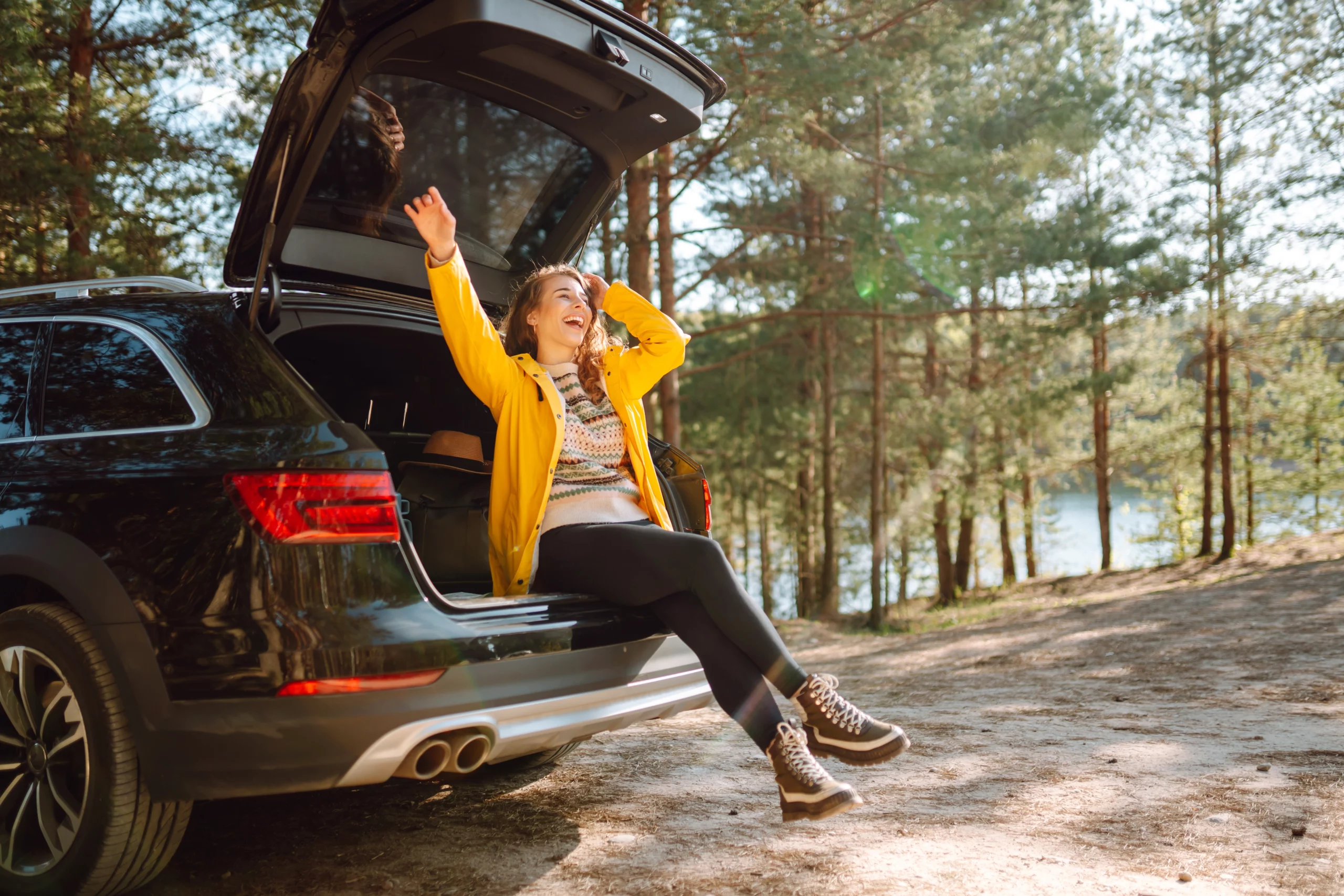 How to Finance a Car; woman sits with brand new car | Oceania Finance